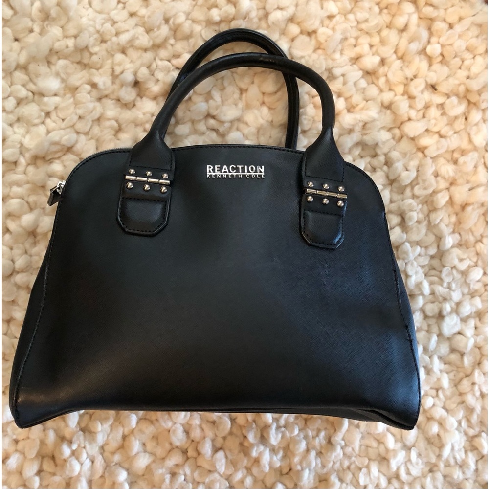 Kenneth Cole Reaction purse. 2 zipper compartments and 1 inner snap compartment